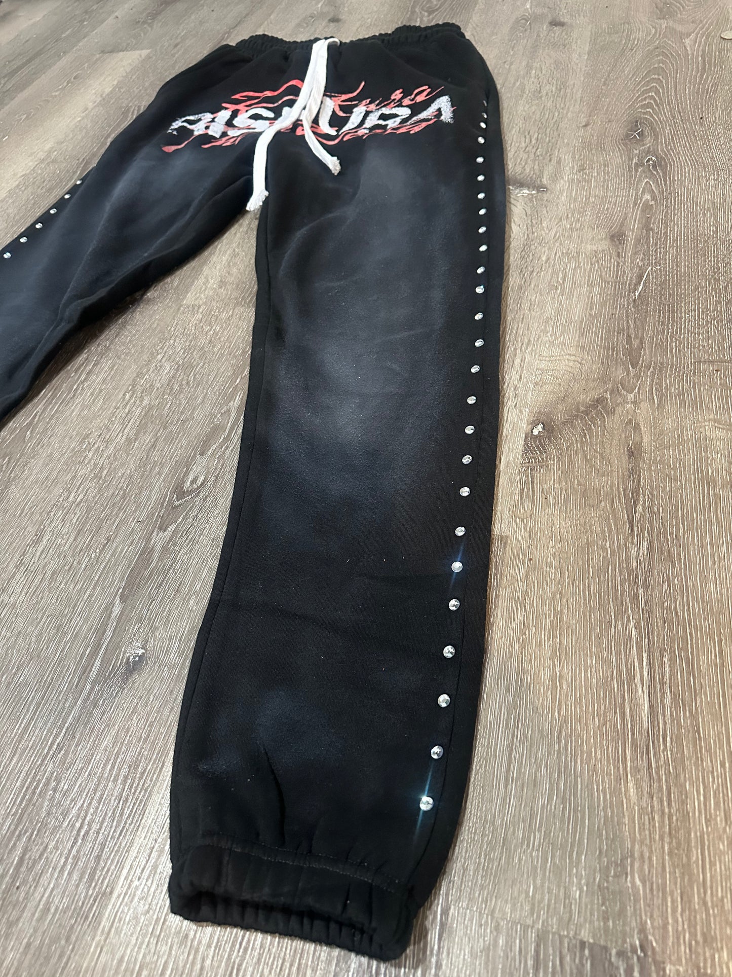 Black heavyweight “Riskura” joggers